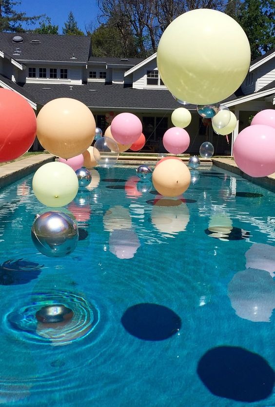 Ballons in pool for Marjana's Birthday