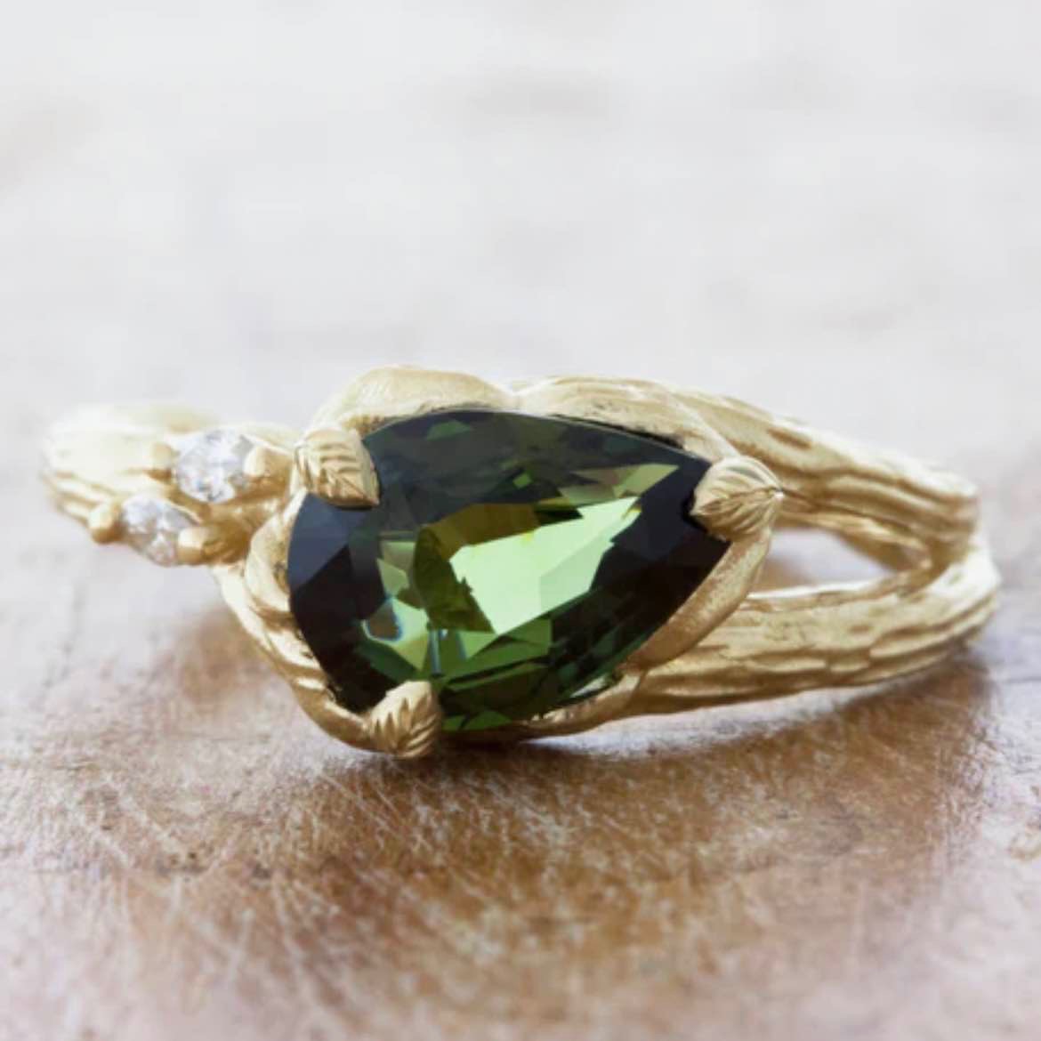 Nature-inspired split shank sapphire engagement ring
