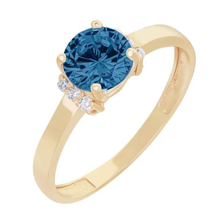 Ring. Red gold with London topaz.